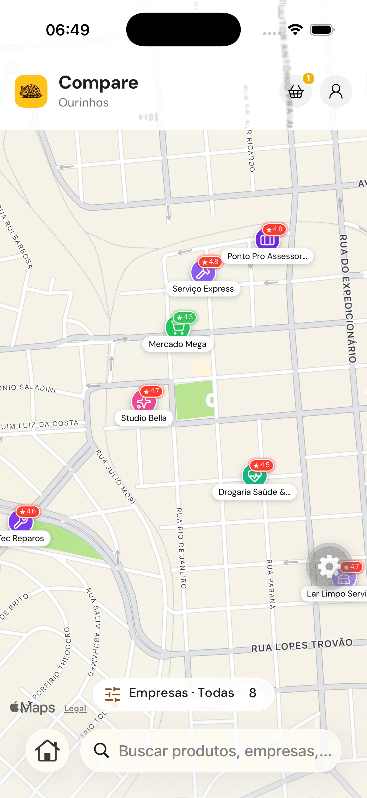 Mapa do app com as lojas do bairro marcadas pelo ícone e pela cor da categoria, cada uma com a nota ao lado