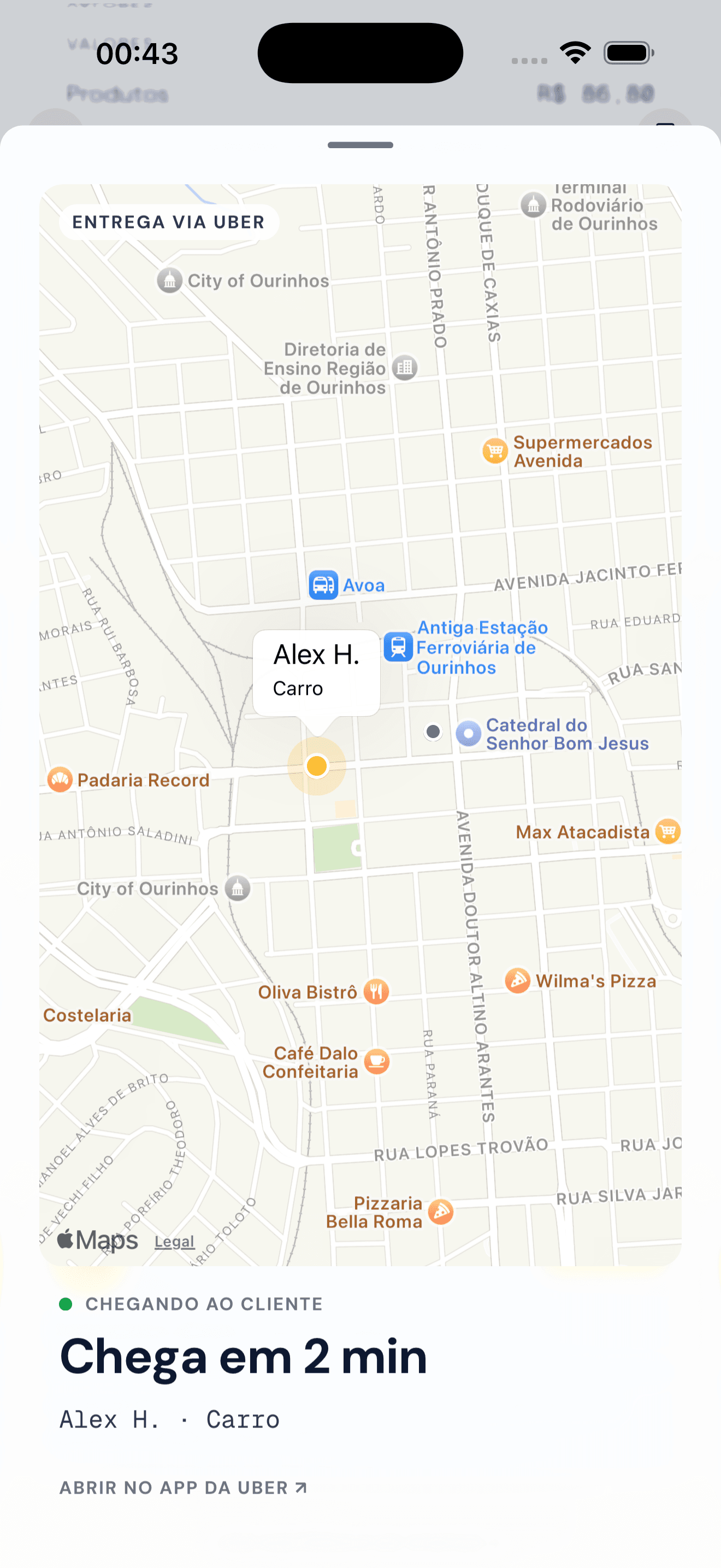 Mapa da cidade com o entregador a caminho do cliente, chegando em 2 minutos